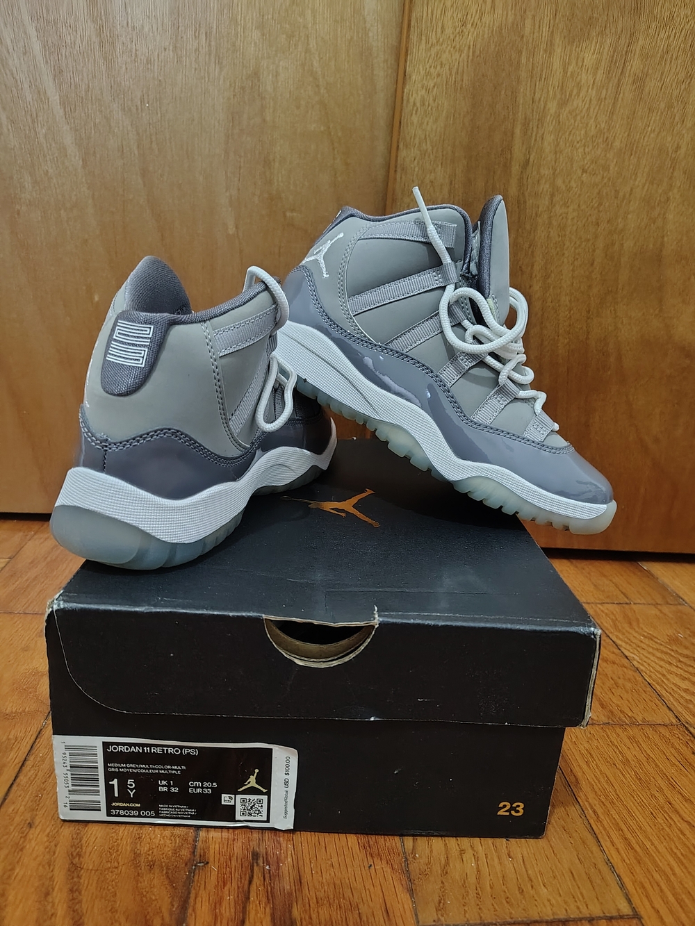 Air Jordan 11 Retro Men's Sneakers in Grey and White